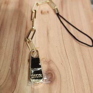Dior phone charm